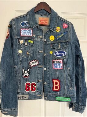 Levi's Blue Denim Trucker Jacket with Multicolor Patches and pins